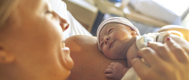 New born baby with his mother