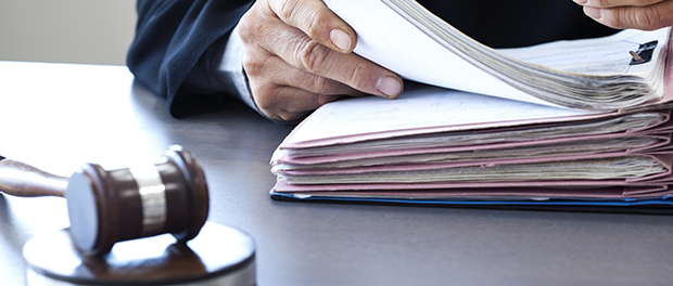 Judge with gavel on table