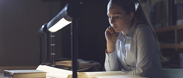 Woman studying late at night